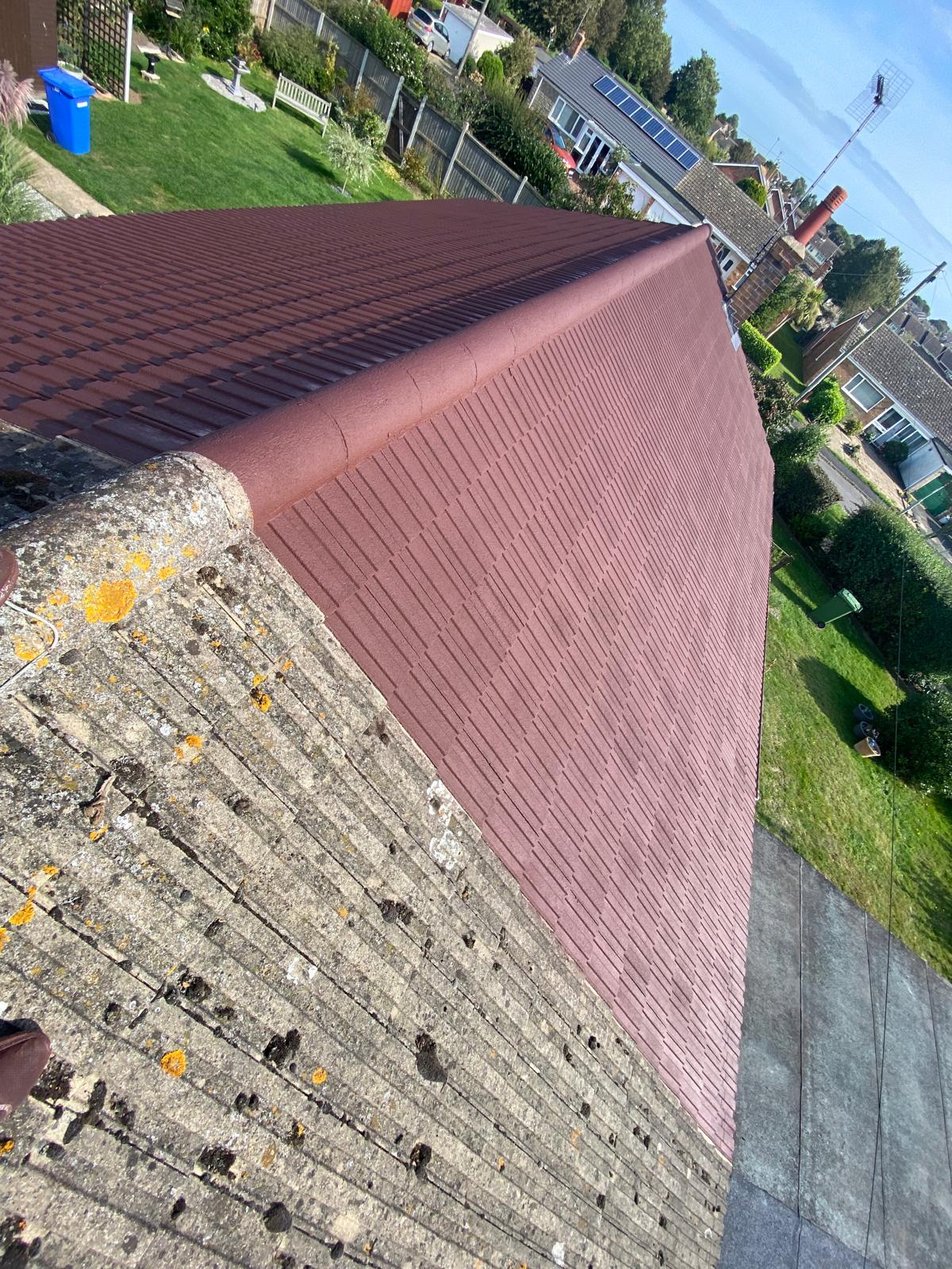 IMG-20250314-WA0027 Applying a protective roof coating to extend the lifespan of tiles in West London, United Kingdom