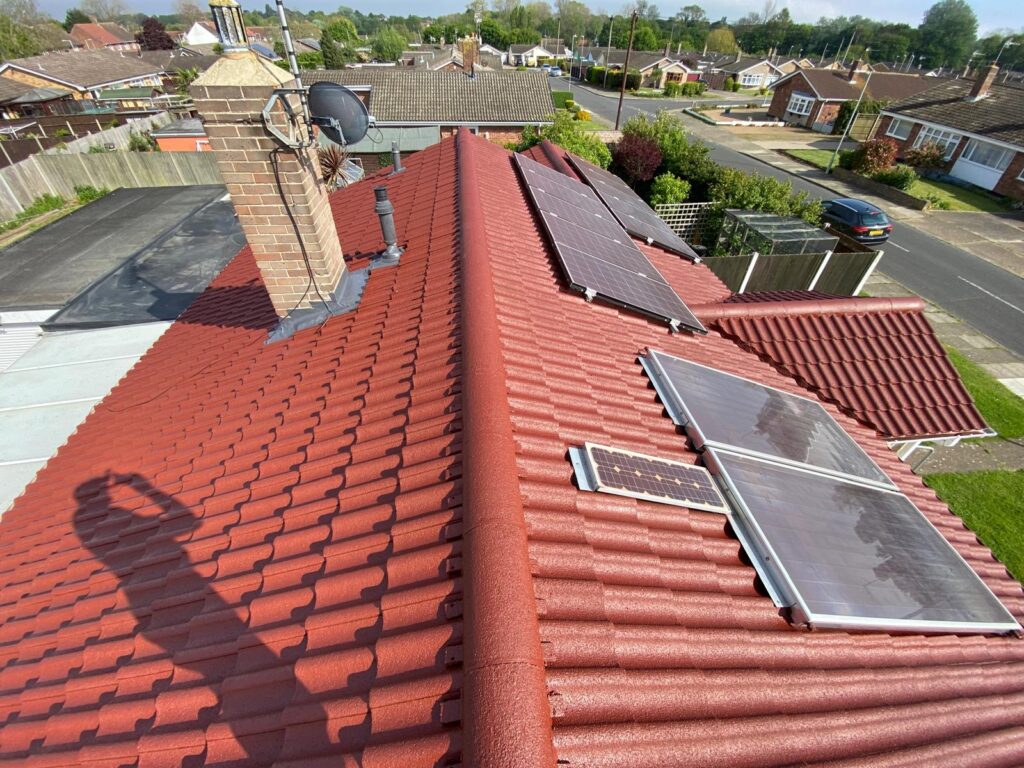 Applying a protective roof coating to extend the lifespan of tiles in West London, United Kingdom