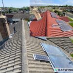 Before and after comparison of roof cleaning, showing moss removal from a house in Ealing, West London, UK.